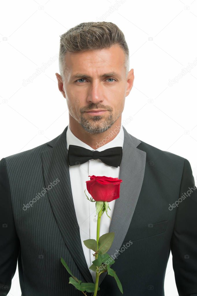 will you marry me. valentine day greeting. handsome man black suit. man on love date. Black tie for private party. tuxedo man with rose. happy valentines day. Bow tie with rose. engagement