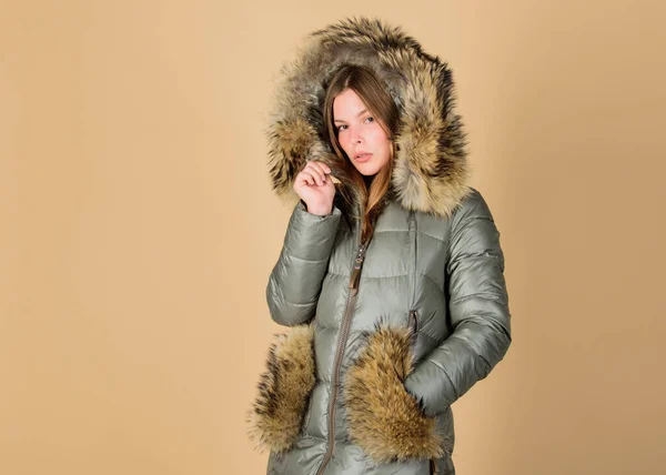 Shopping concept. Black friday. Personal stylist service. Buy winter clothes. Sale and discount. Woman shopping try winter clothes. Shopping guide. Fashion boutique. Faux fur. Girl wear warm jacket
