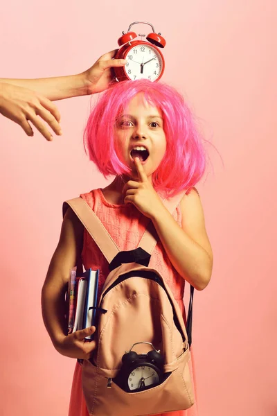 School girl with pink wig and surprised face expression — Stock Photo, Image