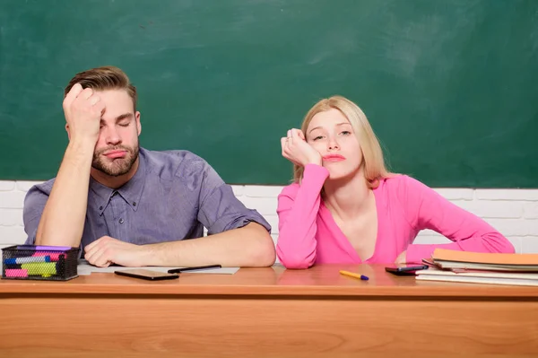 Student life issues. Feeling bored. Studying in college or university. Apply for free program. Couple friends student studying university. Guy and girl tired or lazy student lean on desk in classroom — Stock Photo, Image