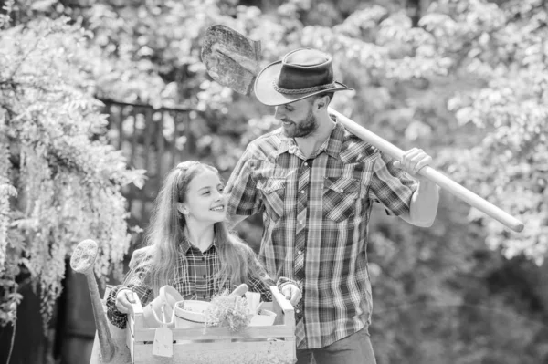 Spring village country. little girl and happy man dad. earth day. ecology. Gardening tools. family farm. summer farm. daughter and father on ranch. Best service for you — Stock Photo, Image