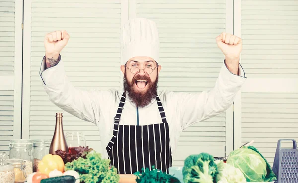 Best quality. Cuisine culinary. Vitamin. Healthy food cooking. Mature hipster with beard. Dieting organic food. Vegetarian salad with fresh vegetables. Happy bearded man. chef recipe