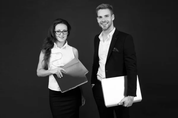 Entrepreneurial relationship. Couple of business partners. Business professionals at work. Sexy woman and handsome man hold business papers. Formal business meeting — ストック写真