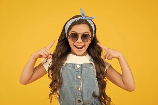 Vacation mode. Fashion trend. You can have anything you want in life if dress for it. Little fashionista. Cute kid fashion girl. Summer fashion concept. Girl long curly hair sunglasses tied headscarf