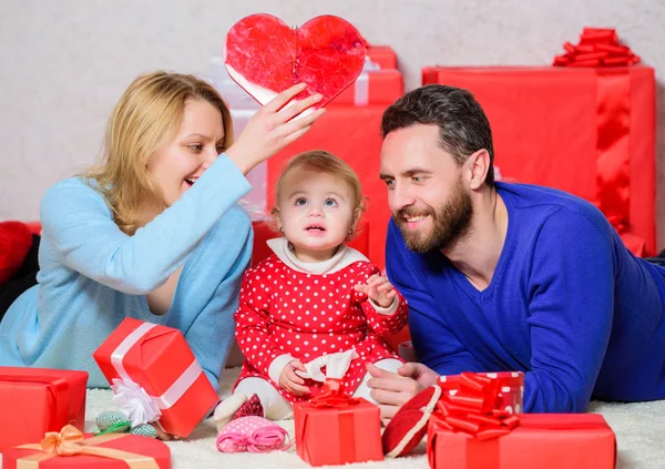 Lovely family celebrating valentines day. Happy parents. Life can not be better. Family celebrate anniversary. Couple in love and baby daughter. Valentines day concept. Together on valentines day
