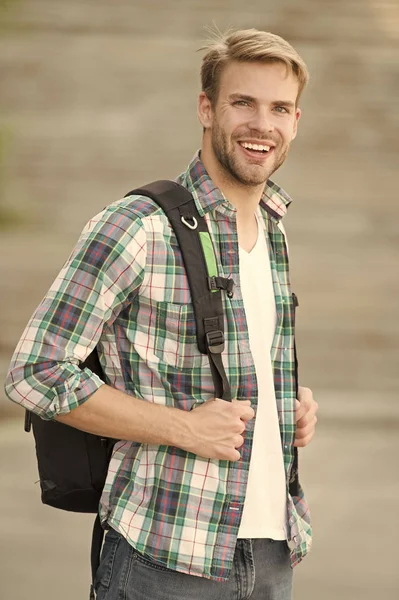 Education boost successful future. Man regular student appearance. College education. College life. Modern student. College student with backpack urban background. Handsome guy study in university
