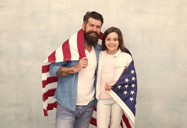 Independence day public holiday. How do americans celebrate independence day. Father and daughter with USA flag. Patriotic family. Independence day is chance for family members to reunite and relax