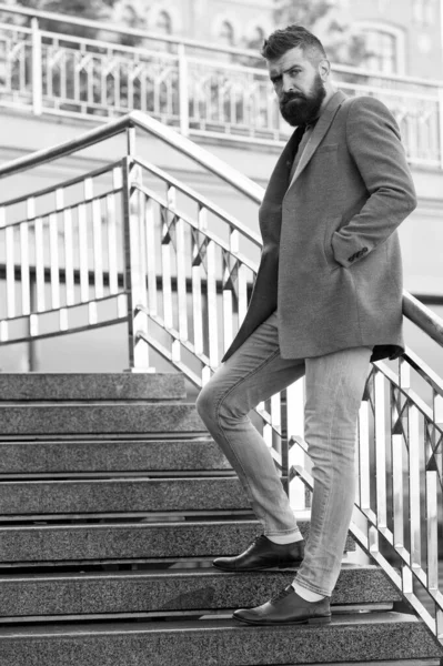 One step at a time. Beginning of working day. Motivated for success. Conquer business world. Office worker confidently step on stairs. Bearded business man going to work. Business man in modern city — Stock Photo, Image