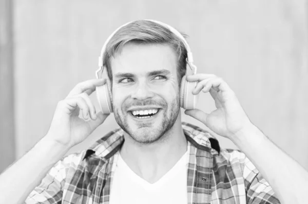 Happy man. College student earphone. Online education. Audio book concept. Educational technology. modern student e learning. College life. Listen music. Modern and digital youth. Try different thing — Stock Photo, Image
