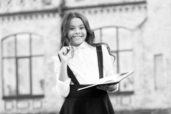 Cognitive process. Start new school project. Towards knowledge. Students life. School student. Intelligent child. Welcome back to school. School girl formal uniform hold book. Intellectual task — Stock Photo, Image