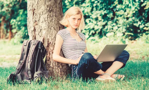 woman work on laptop. students life. Pretty woman. online education. student girl study online. modern woman student study online outdoor. student prepare for exams. Lost in thoughts