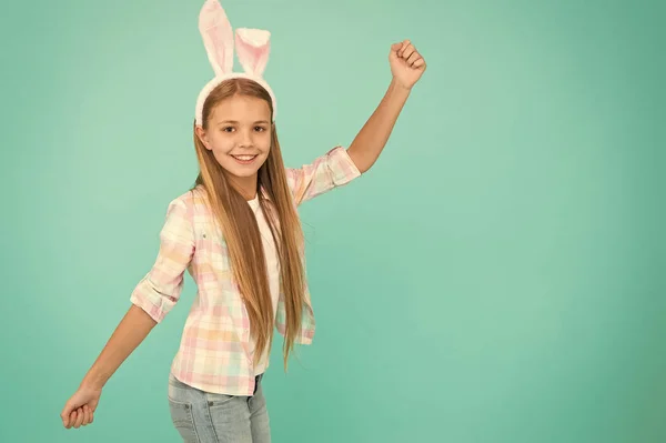 No easter party is complete without easter bunny. Fashion accessory for easter party. Small girl child in easter bunny style. Cute little girl wearing bunny ears headband. Looking pretty and adorable — Stock Photo, Image