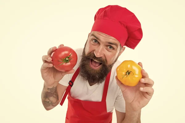 Jump to diet. Happy bearded cook hold tomatoes. Professional chef cook vegetarian food. Cooking vitamin vegetables. Daily diet. Vegetarian or vegan diet. Diet and dieting. Healthy eating