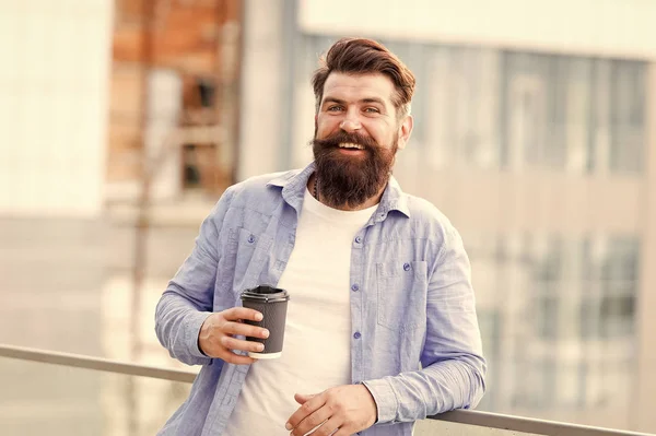 Coffee completes me. Make yourself useful. Man drink take away coffee. Bearded man relax outdoors. Coffee break concept. Caffeine addicted. Morning coffee. Mature hipster enjoy hot beverage
