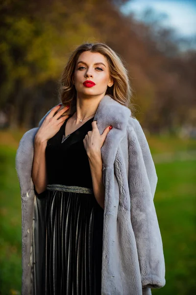 elegant and exquisite lady wear fur. business woman in fur coat. magic of real fur truly saves the day. still trendy today. pure female beauty. purchase real fur online. the winning formula