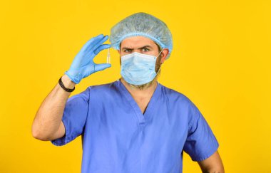 Yeni virüs türüne karşı aşı üretiyor. Coronavirus nedir? Enfeksiyonun nedeni Coronavirus ailesinin virüsü. Hastalık Çin 'de tedavi edildi. Coronavirus solunum sendromu. Doktor bekleme test tüpü