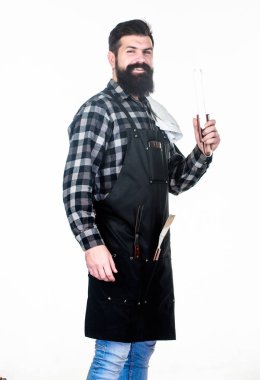 Barbecue and grill. Barbecue cook using kitchen tongs. Bearded man holding barbecue tongs in hands. Chef hipster holding stainless steel tongs. Using tongs for preparing and serving barbecue food clipart
