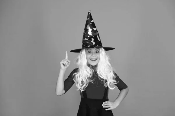 Ghosts have real spirit. Little child witch costume. Halloween party. Small girl in black witch hat. Autumn holiday. Join celebration. Magical spell. Small witch with white hair. Wizard or magician — Stock Photo, Image