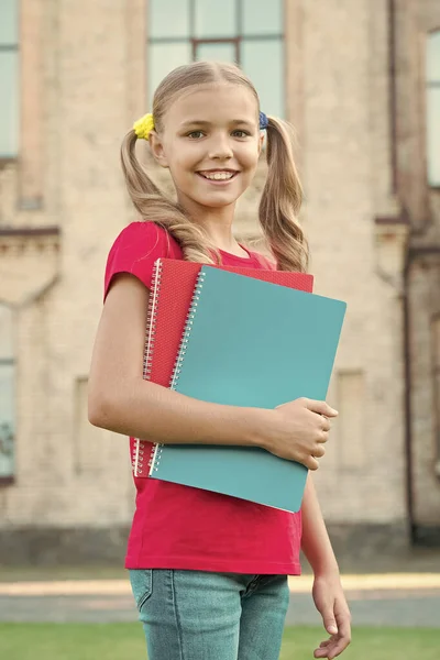 Library of her dreams. Cute library reader. Small child go to library. Adorable little girl borrow books from school library. Bibliopole. Bookstore — Zdjęcie stockowe