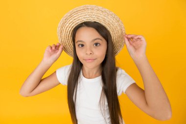 Summer vacation outfit. Ready to relax. Teen girl summer fashion. Little beauty in straw hat. Beach style for kids. Visit tropical islands. Turn back brim straw hat. Happy kid relaxing summer resort