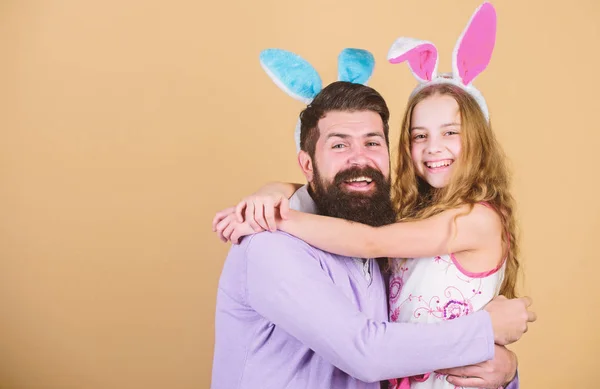 Spring holiday. Easter spirit. Easter activities for whole family. Happy easter. Holiday bunny long ears. Family tradition concept. Dad and daughter wear bunny ears. Father and child celebrate easter — Stock Photo, Image