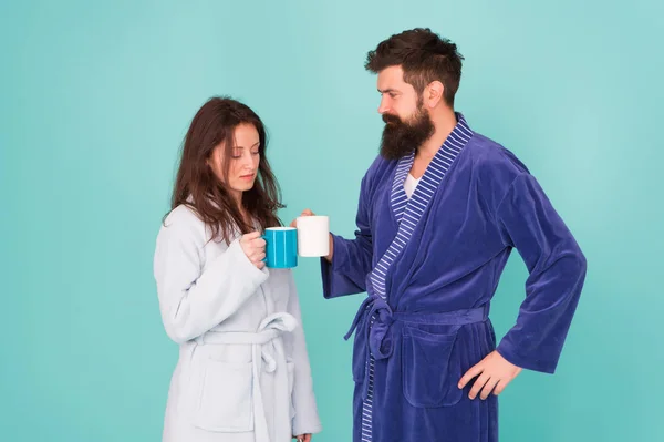getting fresh. morning starts with coffee. first steps of family life. man and woman have breakfast together. couple in love drink cup of tea. morning at home. feeling cosy in robe. source of energy.