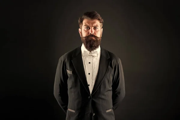 Secure in his sense of self. Bearded man with formal look. Hipster black background. Man with long mustache and beard hair. Brutal man in tuxedo suit. Classic can make man look smarter — Stock Photo, Image