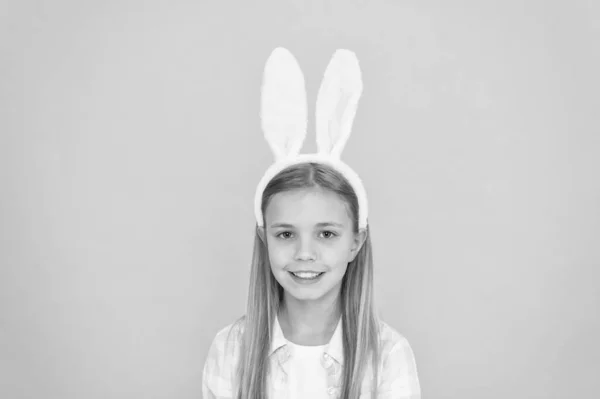 Styling in her Sundays best. Cute little girl wearing bunny ears headband. Small girl child in easter bunny style. Fashion accessory for easter costume party. Looking pretty in easter bunny attire — Stock Photo, Image