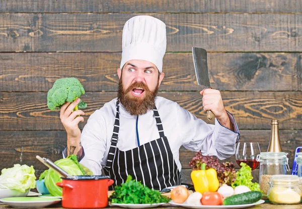 My kitchen my rules. Chef use fresh organic vegetables for dish. Vegetarian meal. Organic food. Fresh ingredients only. Man bearded hipster cooking fresh vegetables. Freshest possible ingredients