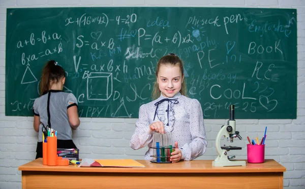 Science experiments. Studying hard for good grades. Chemistry research. Biology science. Happy little girls. Little girls in school lab. Science is future. Little girls scientist work with microscope — Stock Photo, Image