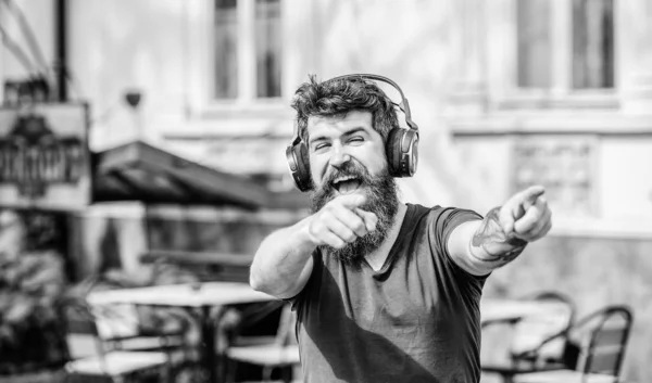 Mature hipster with beard. Music fan. Satisfied with his work out. Enjoying music. Bearded man. Enjoying work music. Feeling calm. Style and music is his passion. Confident and handsome brutal man — Stock Photo, Image