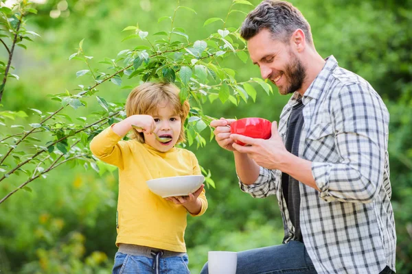 Nutrition habits. Family enjoy homemade meal. Healthy breakfast. Father son eat food. Little boy and dad eat. Nutrition kids and adults. Tasty porridge. Organic nutrition. Healthy nutrition concept — Stock Photo, Image