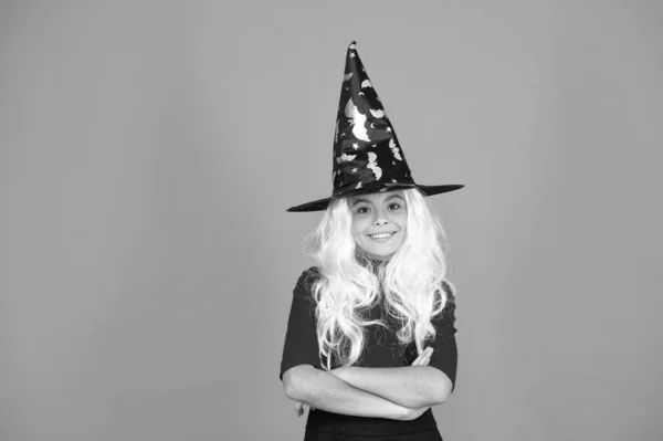 Magical spell. Small witch with white hair. Wizard or magician. Ghosts have real spirit. Little child witch costume. Halloween party. Small girl in black witch hat. Autumn holiday. Join celebration — Stock Photo, Image