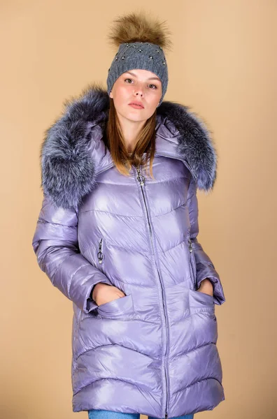 Faux fur. Fashion girl winter clothes. Fashion coat and hat. Fashion trend. Warming up. Casual winter jacket slightly more stylish and have more comfort features such as larger hood fur trim on hood — Stock Photo, Image