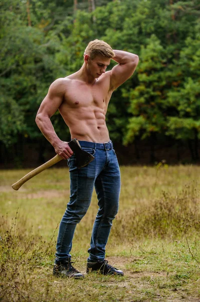 Sexy macho bare torso. Handsome shirtless man muscular body. Muscular athlete in forest. Sport and fitness. Muscular body. Surviving in wild nature. Brutality is sexy. Strength and power concept — Stock Photo, Image