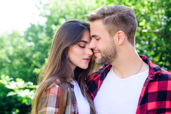 Never boring. couple in love. Hiking. hipster couple outdoor. family weekend. romantic date. man and woman in checkered shirt relax in park. valentines day. summer camping in forest — Stock Photo, Image