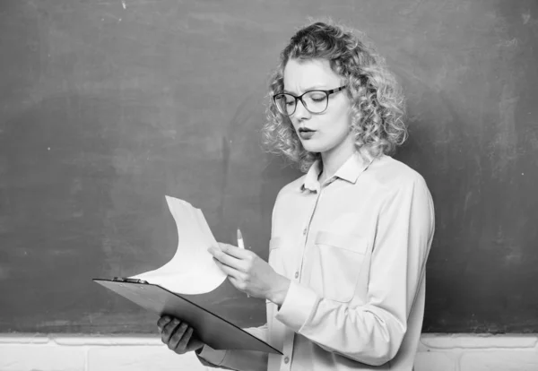 new school year. Girl prepare for exams. teacher with document folder. Business school. girl teacher at school lesson. report project. back to school. student in glasses at blackboard