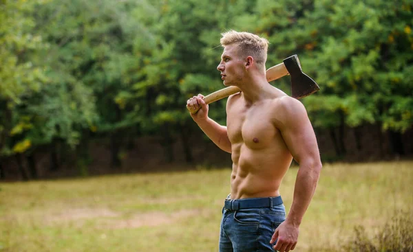 Sexy macho bare torso. Surviving in wild nature. Muscular athlete in forest. Sport and fitness. Muscular body. Brutality is sexy. Strength and power concept. Handsome shirtless man muscular body — Stock Photo, Image