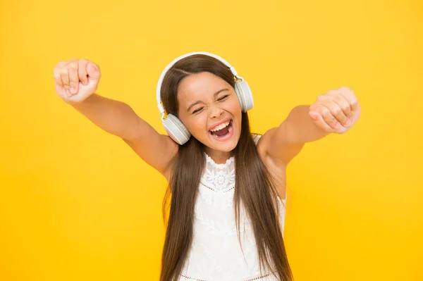 Add song to playlist. Listening music. Girl with headphones. Modern technologies concept. Happy child in earphones. Audio concept. Kid enjoy modern music. Buy new music device. Favorite track — Stock Photo, Image