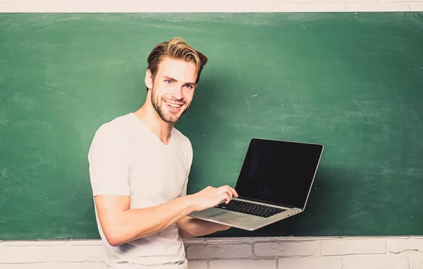 School teacher programming with laptop. Student learn programming language. Programming web development. Digital technology. Apply online course for programmers. Handsome man use modern technology