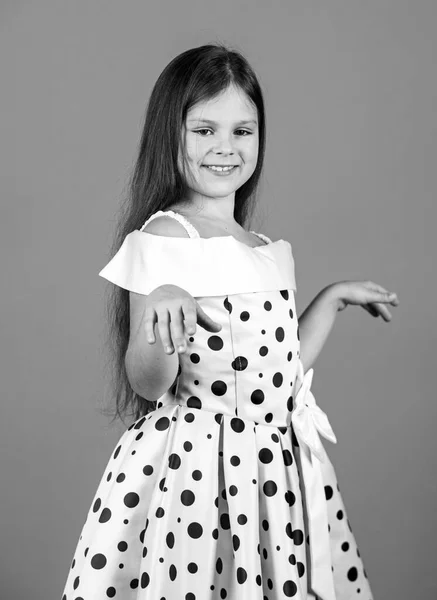 Exquisite manners concept. Vintage trend. Elegant retro kid. Small girl vintage fashion outfit. Glamorous style accessory. Vintage fashion model. Charming little lady wearing polka dot dress — 스톡 사진