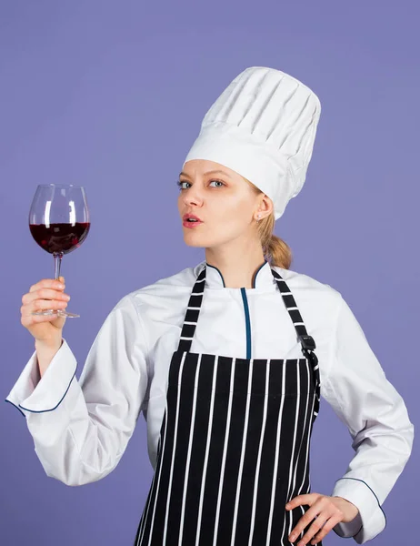 woman chef drink wineglass. Skilled sommelier try wine. evaluating quality of wine. Wine cellar. Healthy menu and Diet. Professional wine expert. man cook holding glass drink