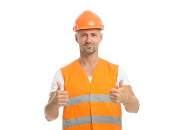 Gelişme var. Hırslı bir proje. Başarılı bir mühendis. Yakışıklı inşaatçı. Erkek koruyucu kask üniforması beyaz arka plan. İşçi üreticisi kendinden emin ve başarılı. Başarı konsepti. İnşa eden gülen yüz