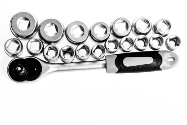 Soket anahtarının topuzu fındık cırcırını kapat. - İngiliz anahtarı. Çelik kaymadan kaygan başlıklı sapı sıkıca tutmamış. Ratchet aleti. Evrensel soket setleri. Ulaşılması zor yerlerde kullanılabilir.