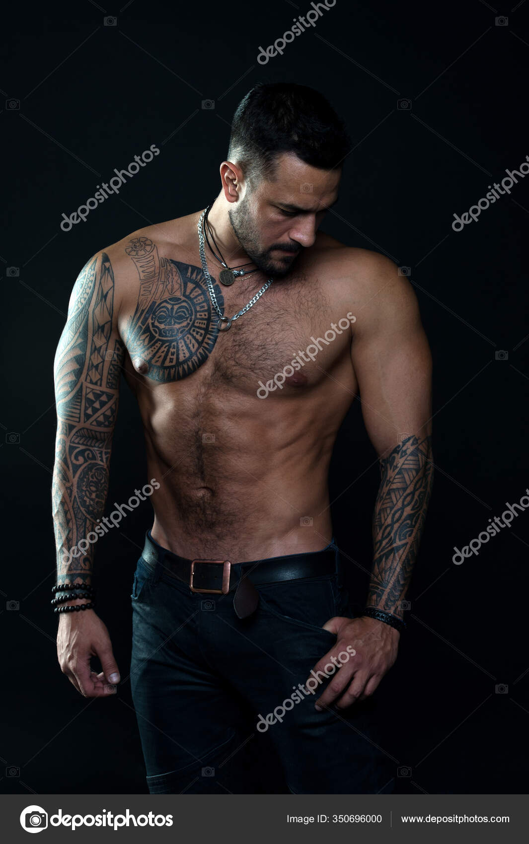 Muscular torso. Jewelry for real men. Bearded man with tattooed torso. Macho sexy bare torso. Fit Muscular torso. Jewelry for real men. Bearded man with tattooed torso. Macho sexy bare torso. Fit
