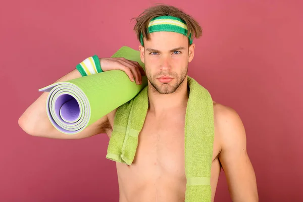 Guy wearing head and wristbands. Athlete with serious face — Zdjęcie stockowe