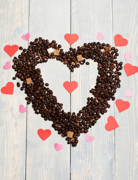 Wzór z ziaren kawy, kostek cukru, anyżu i serc — Zdjęcie stockowe
