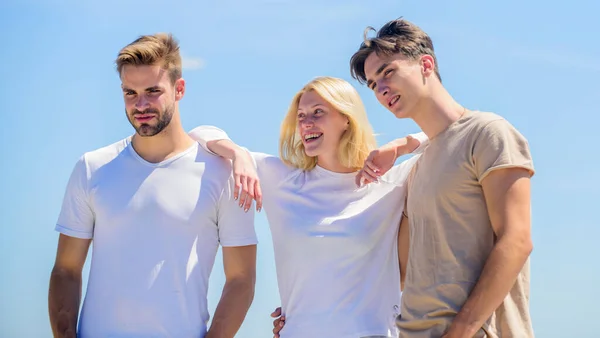 Being together. group of people outdoor. heaven concept. success heights. happy woman and two men. cheerful friends. friendship relations. family bonding and love. summer vacation. time to relax — Stock Photo, Image