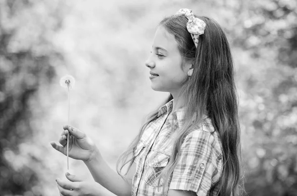 Celebrating summer. Dandelion full symbolism. Summertime fun. Folklore beliefs about dandelion. Girl rustic style making wish and blowing dandelion nature background. Why people wish on dandelions — Stock Photo, Image