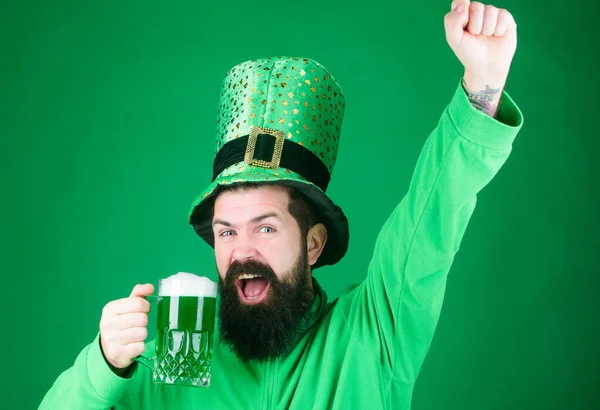 Drinking beer part celebration. Bar seasonal holiday menu. Green beer mug. Cheers. Alcohol beverage. Lets start patricks party. Irish tradition. Man brutal bearded hipster drink pint beer. Irish pub — Stock Photo, Image